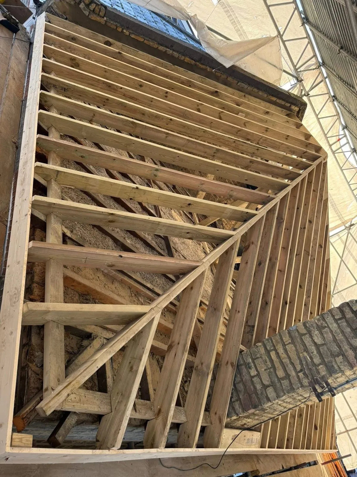 New roof timbers and rafters during a re-roof in Exeter